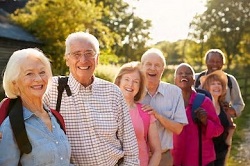 portrait-senior-friends-hiking-countryside.jpg